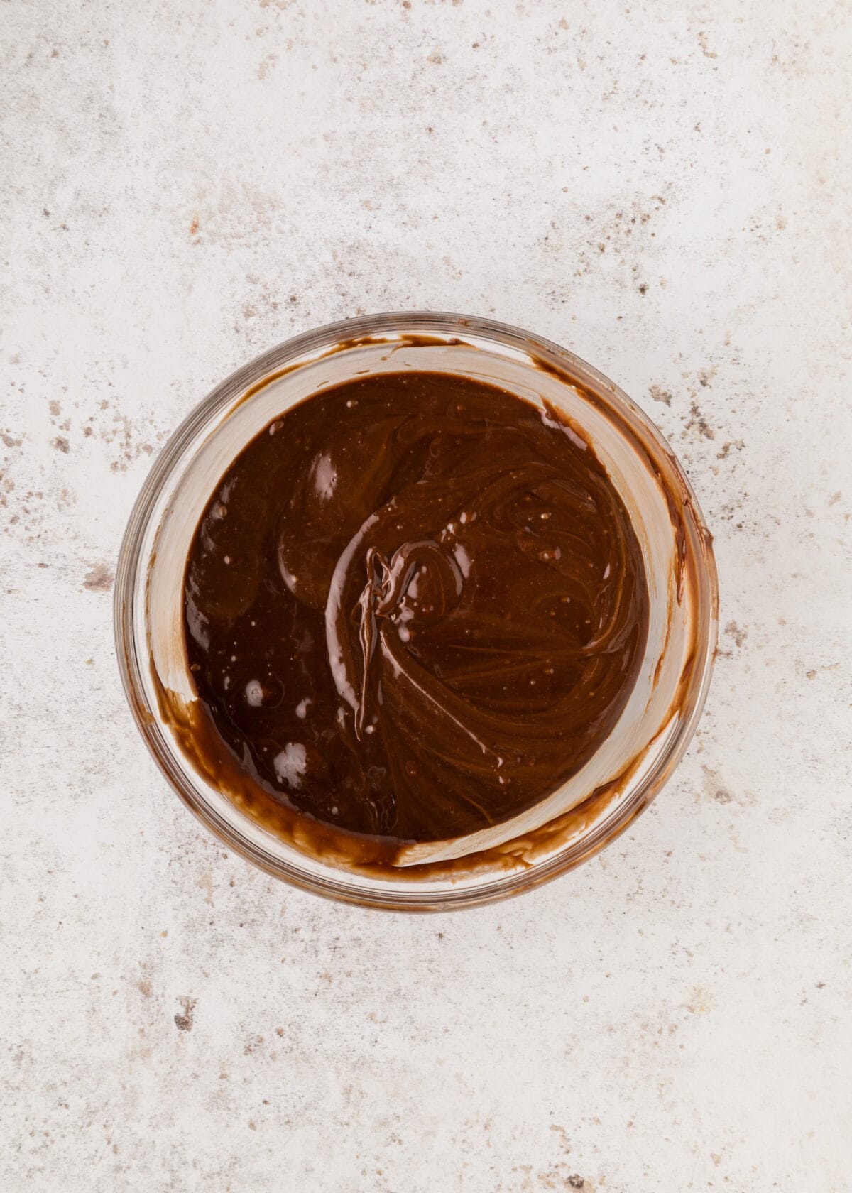 large mixing bowl with chocolate and flour. 