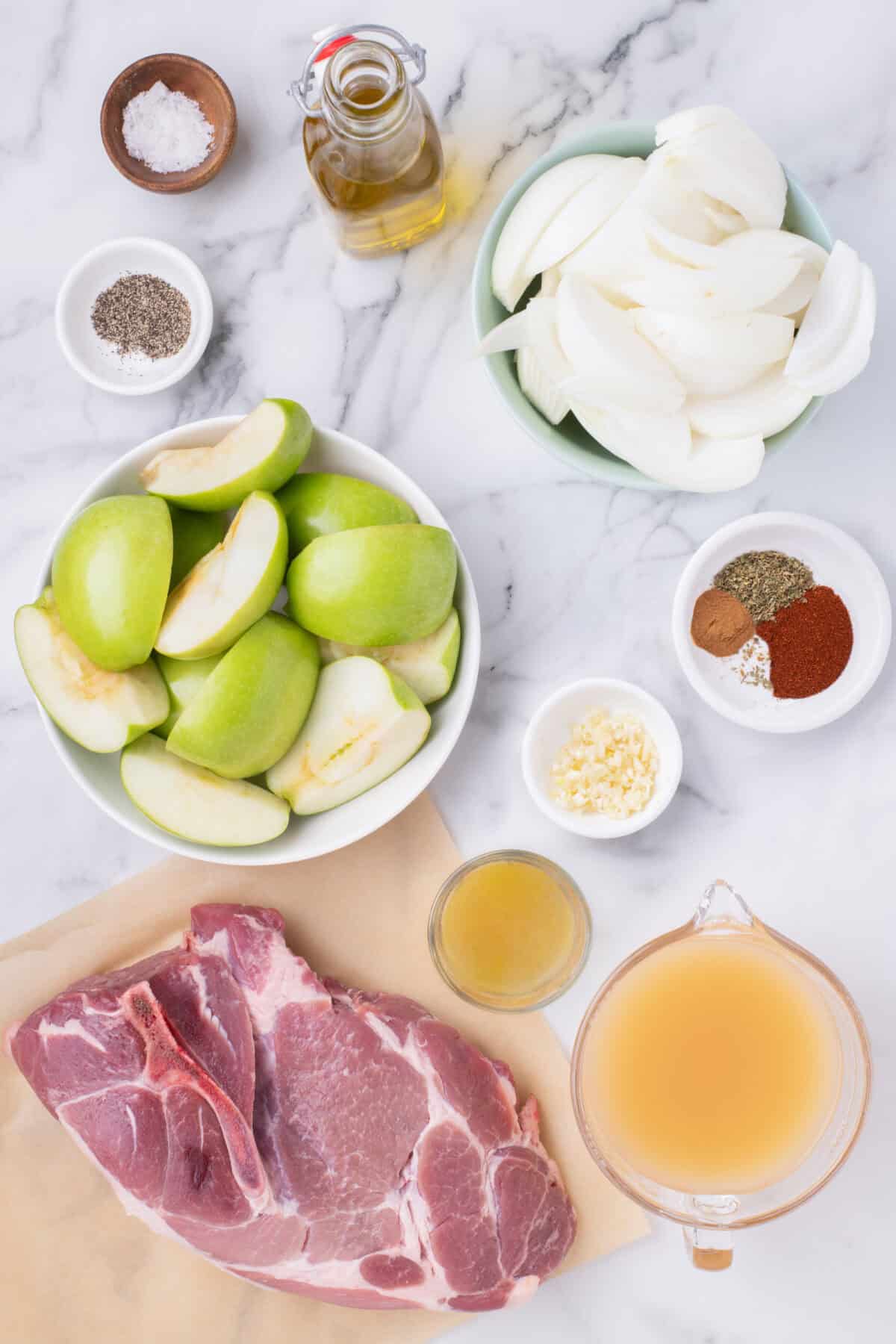 ingredients for the braised pork shoulder in small bowls. 