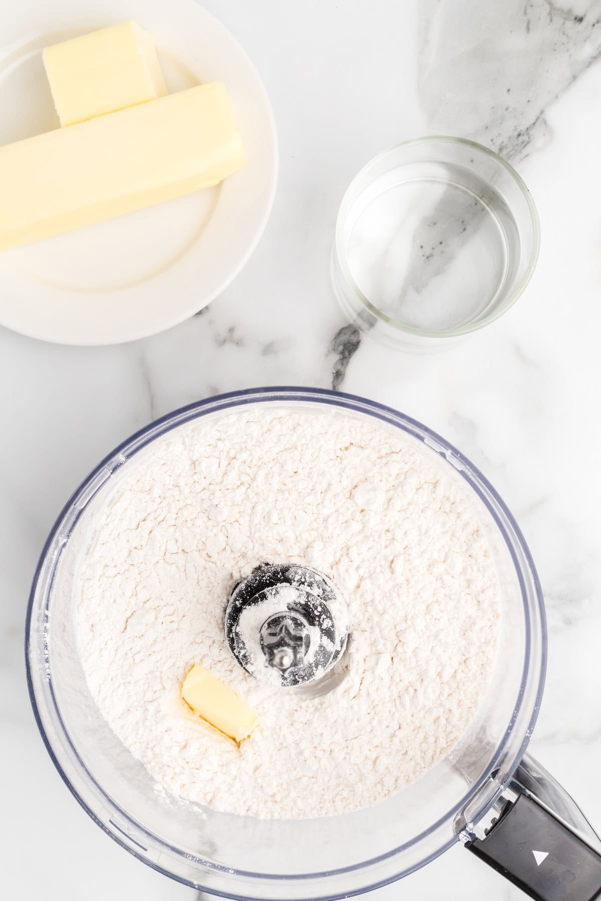 flour and butter in a food processor. 