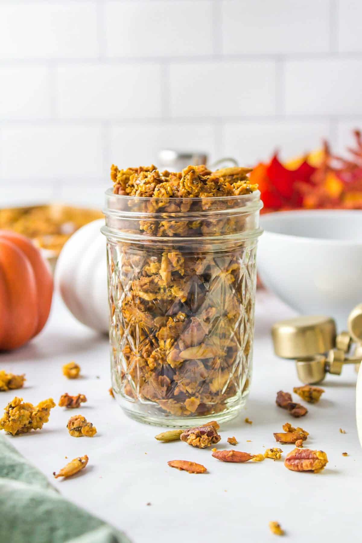 small mason jar of pumpkin granola.