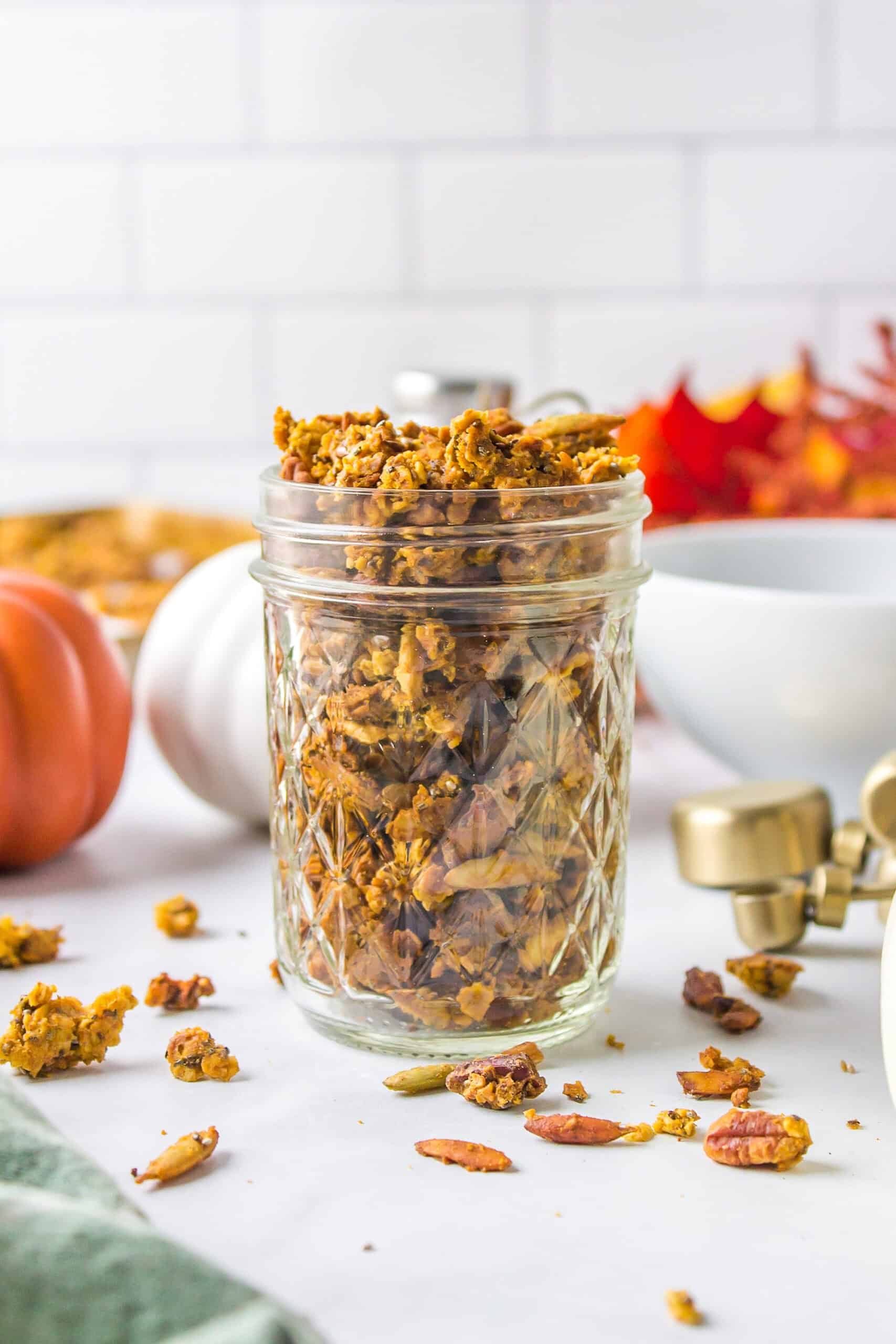 small mason jar of pumpkin granola.