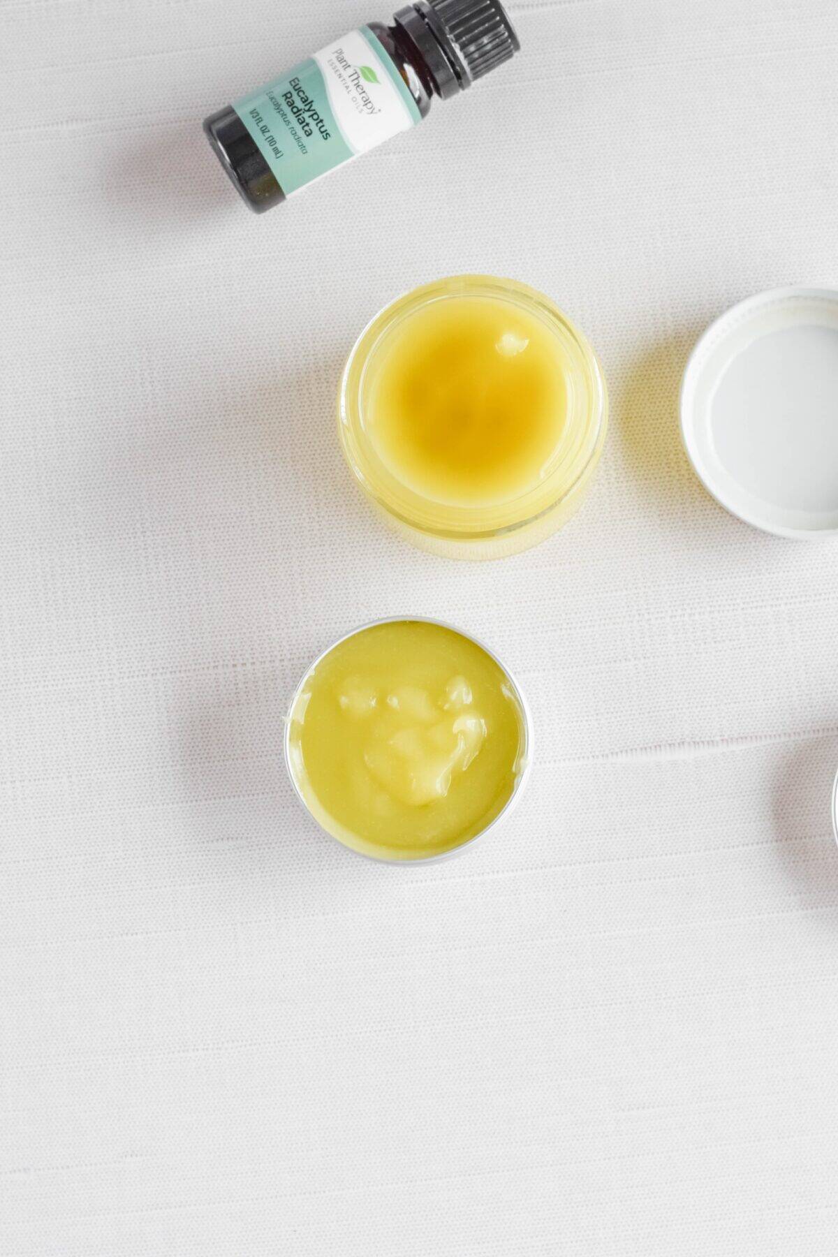 poured Homemade Eucalyptus Salve in small jar and tin. 