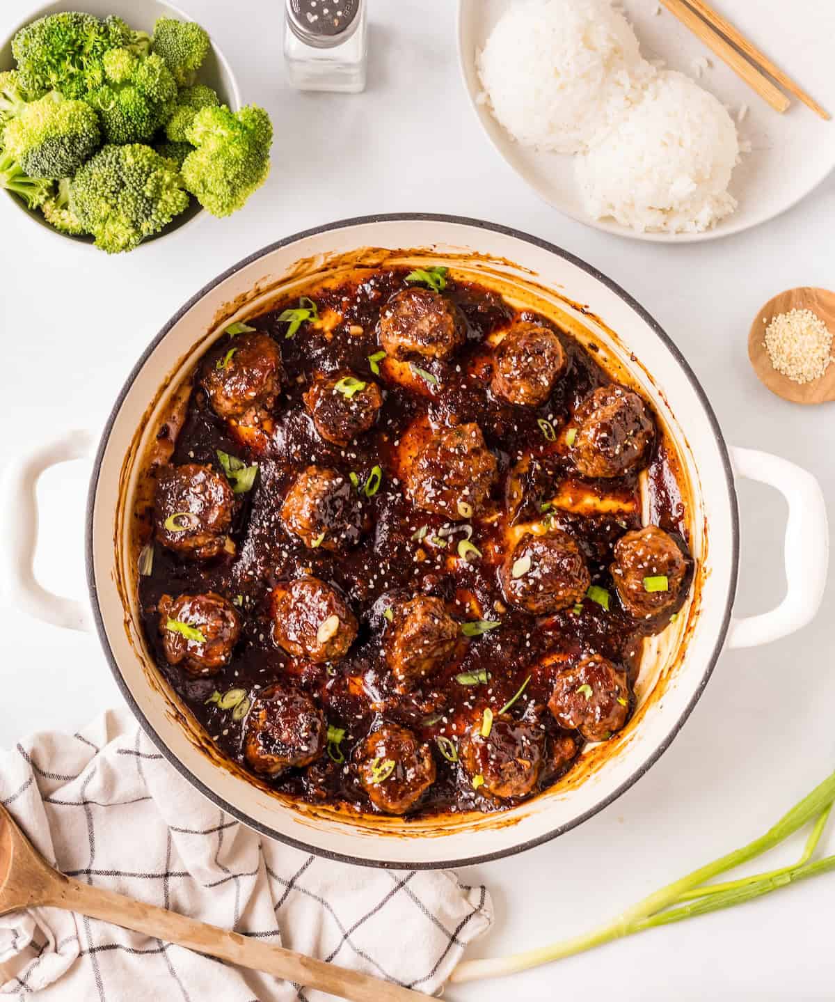 finished Mongolian beef meatballs in a white skillet.
