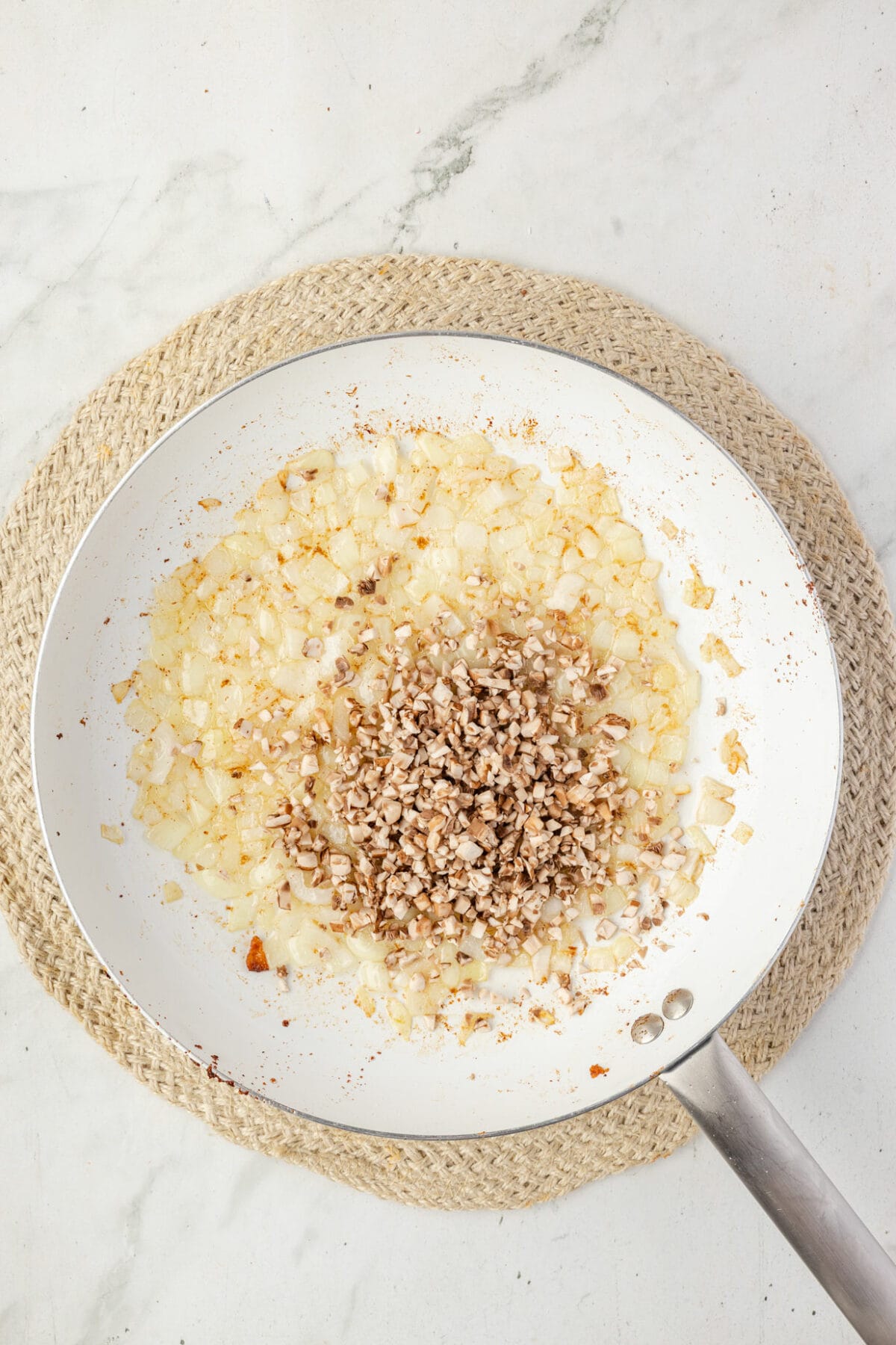 chopped onions and mushrooms in a skillet. 