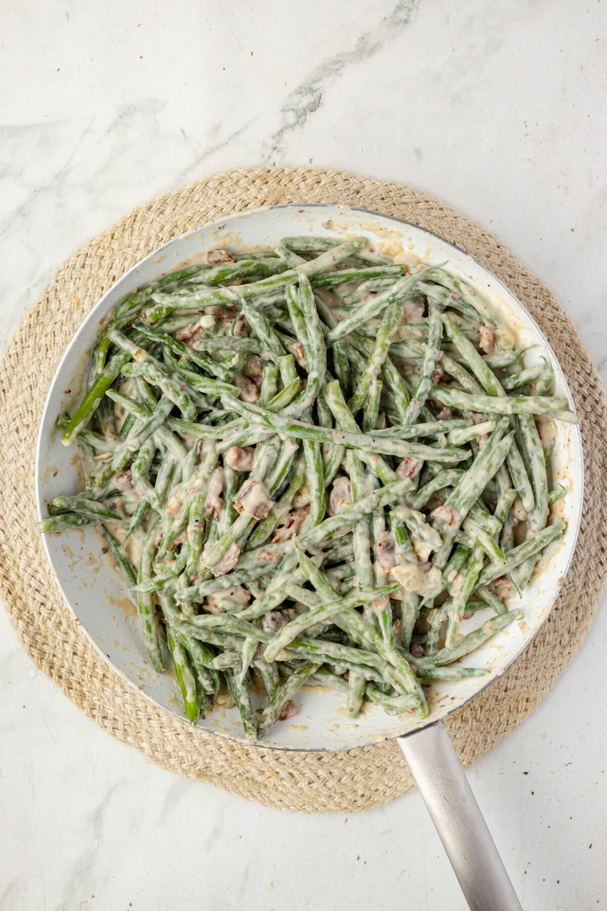 fresh green beans combined with the cream cheese sauce in the skillet. 