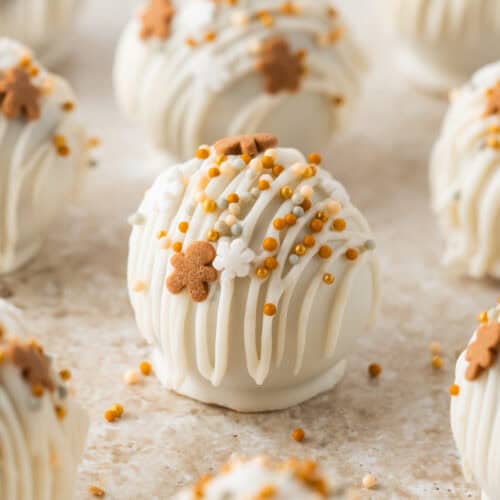 finished gingerbread truffles with a white chocolate drizzle and festive sprinkles.