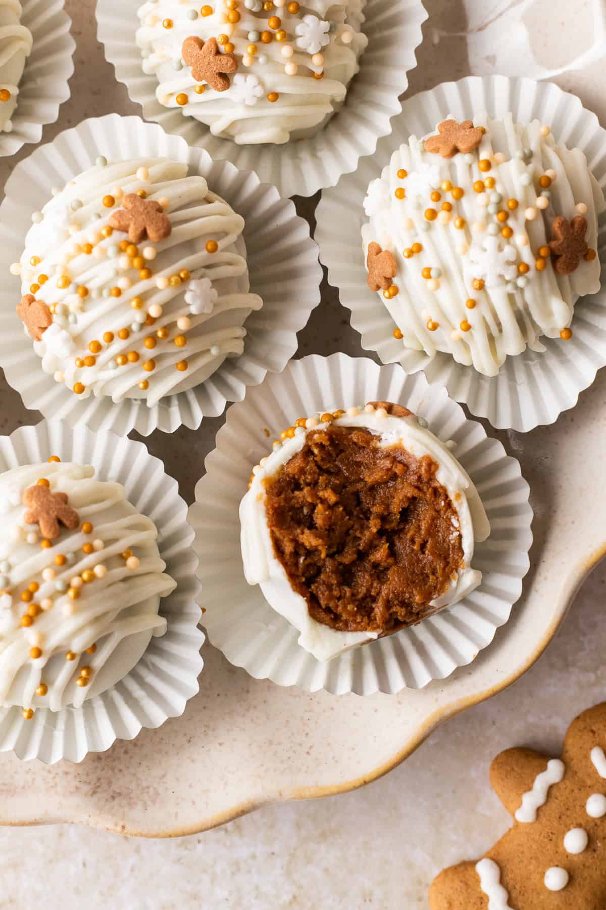 gingerbread truffles in candy wrapper parchment on a plate. 